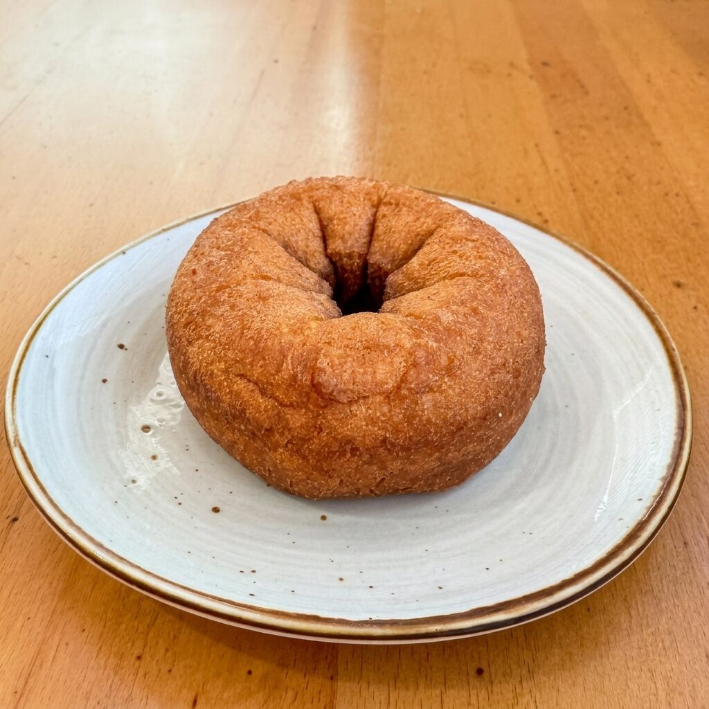 Old-fashioned donut with golden-brown crust